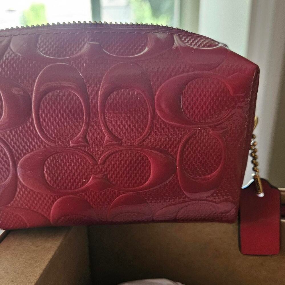 Coach red wristlet with chain